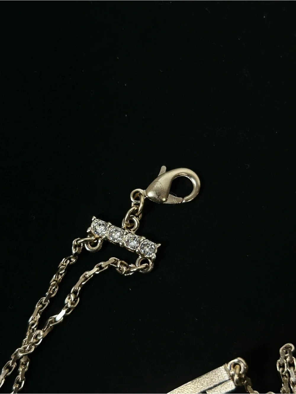 CHANEL logo pendant